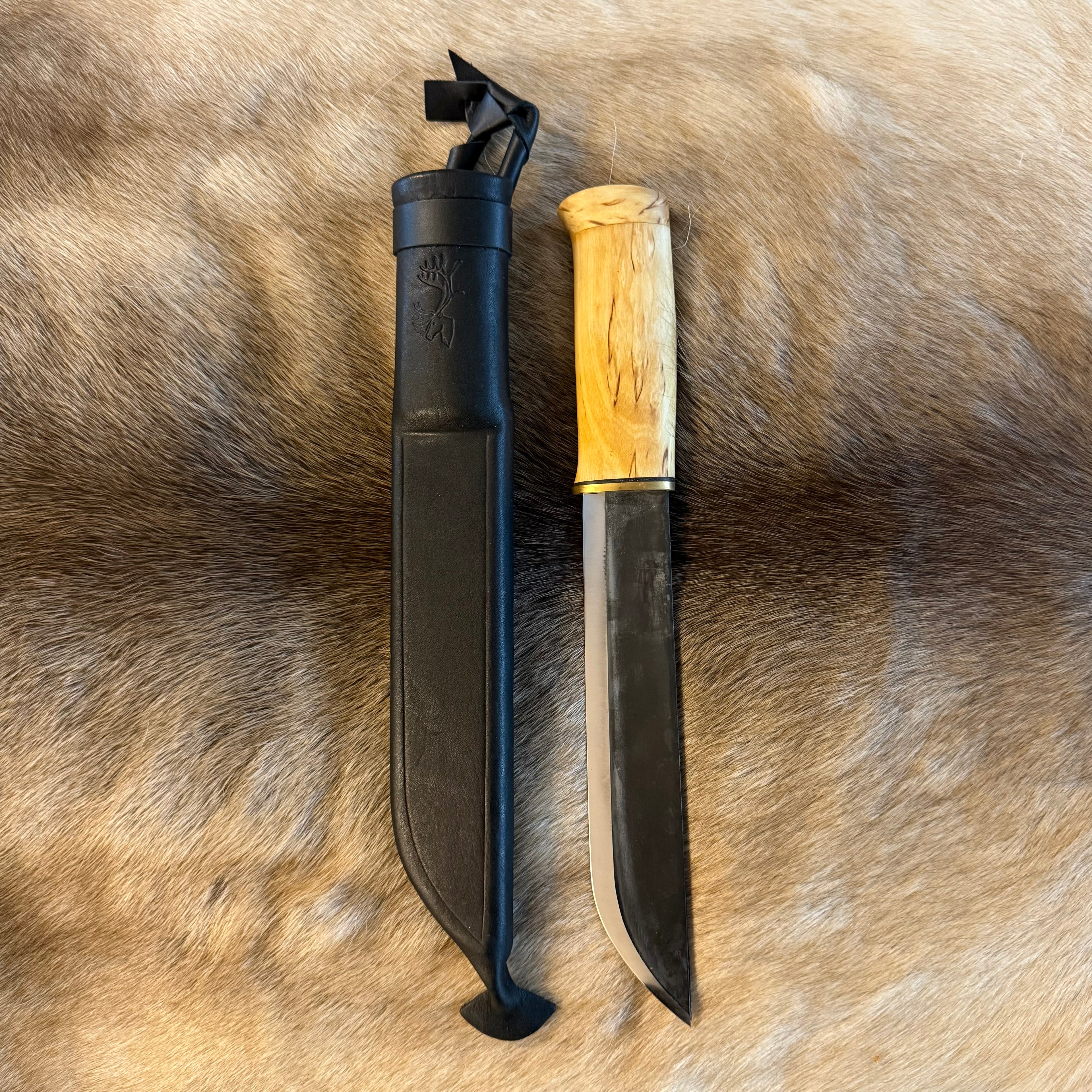 Huggare i masurbjörk, nitad topp och svart fodral