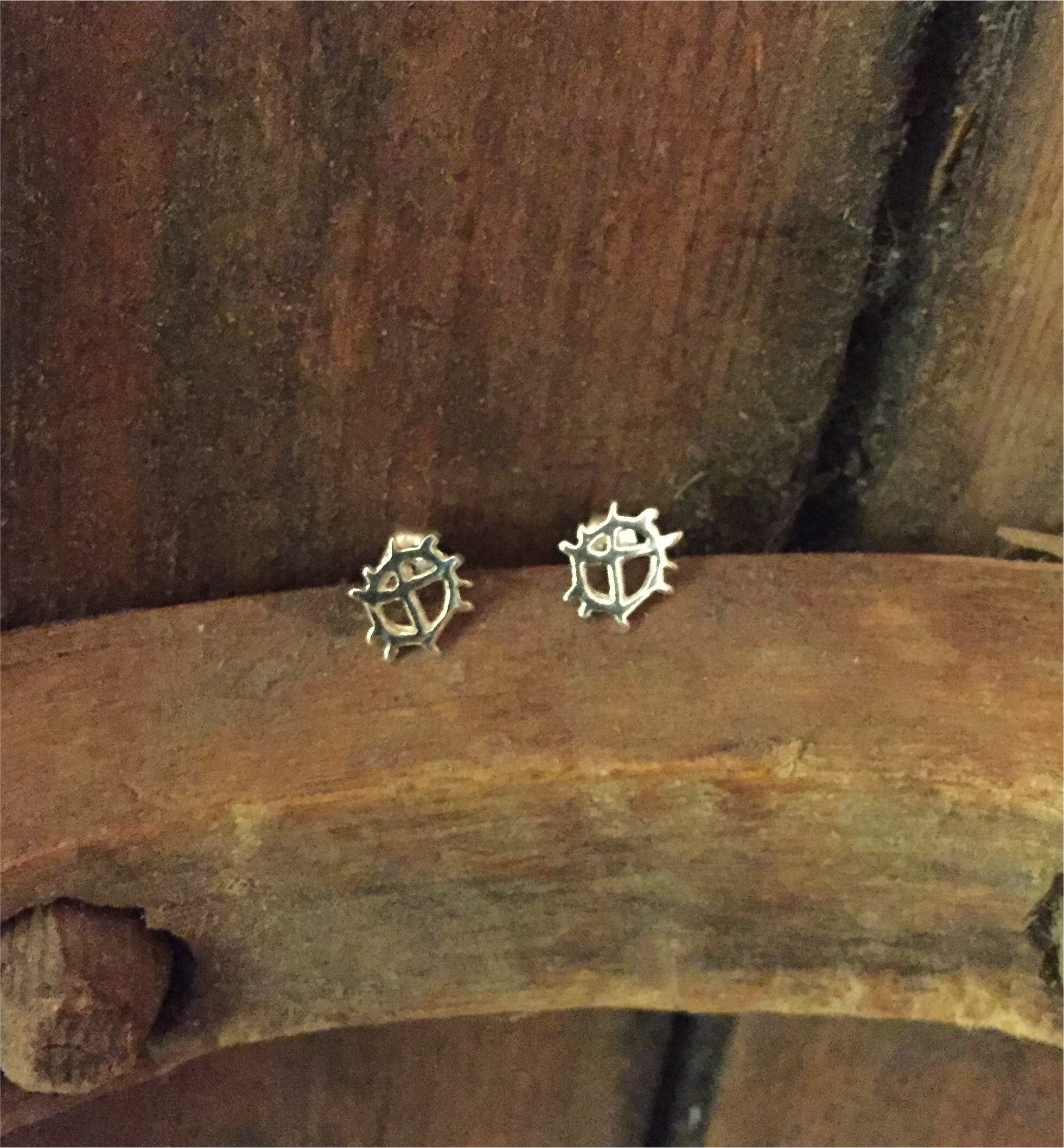 Örhänge i silver Solen stift samisk design