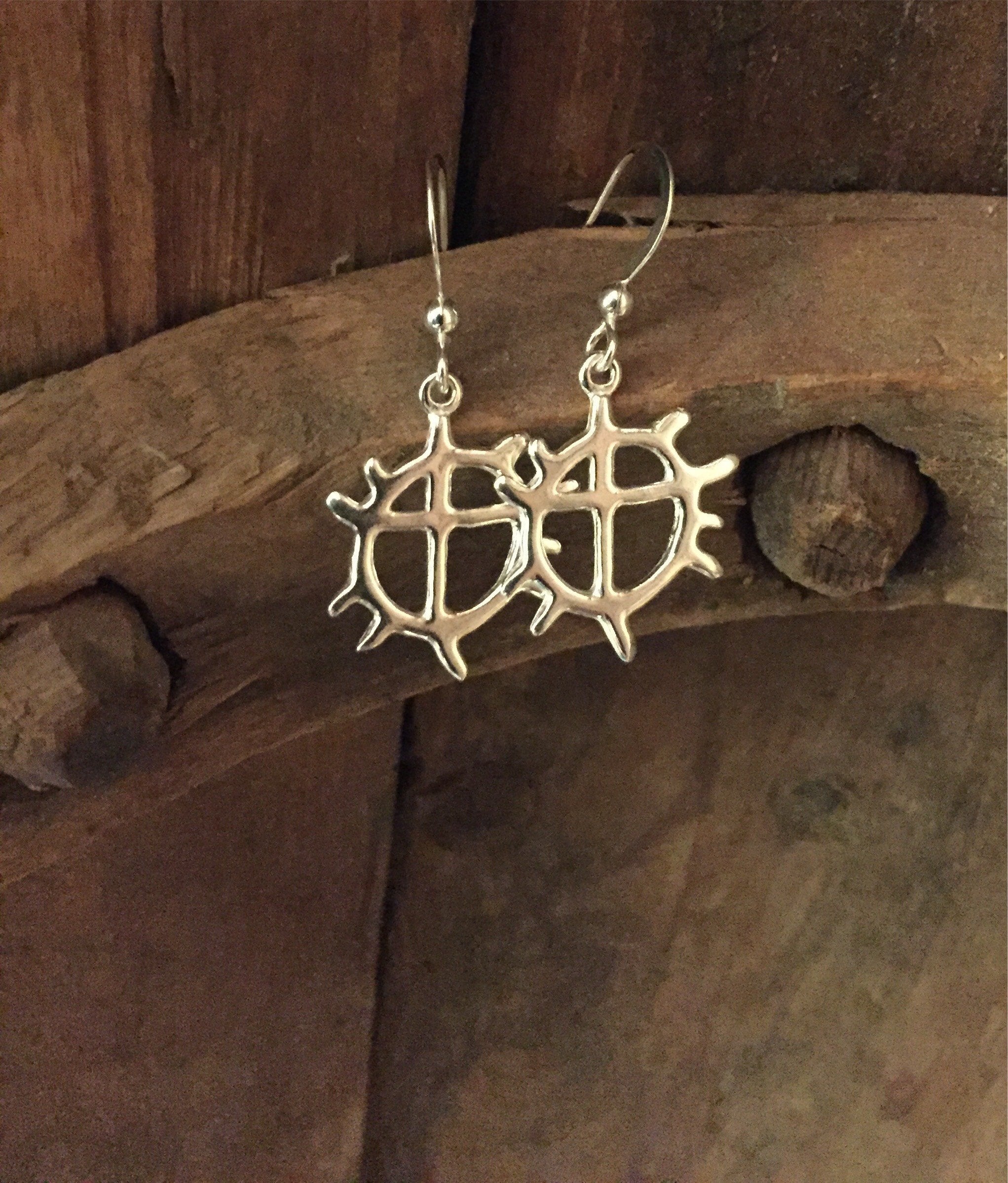 Örhänge i silver Solen i samisk design