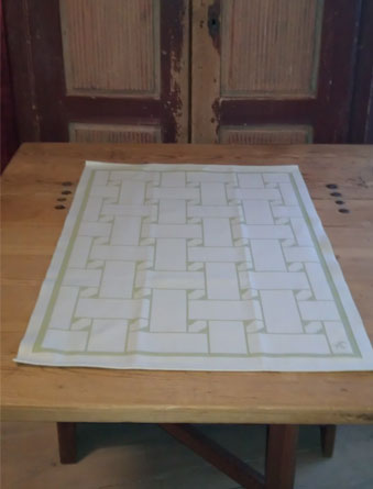 Handduk med rak sydsamisk fläta i design av Doris och Sven-Åke  Risfjell